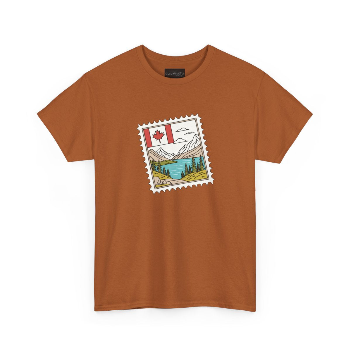 On the front of this custom Canadian pride short sleeve shirt is an image of a Canadian postage stamp with the Canadian flag in one corner and an image of mountains, a lake, and trees the make up the rest of the stamp.