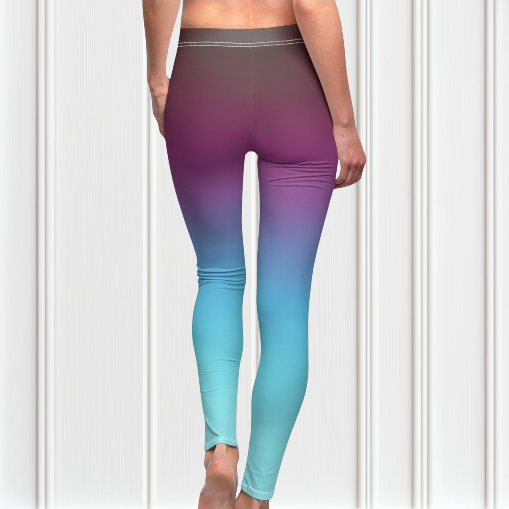 These custom handmade high waisted women's leggings have a ombre pattern with the top of the leggings being a deep purple in color then it fading to a bright turquoise blue at the bottom.