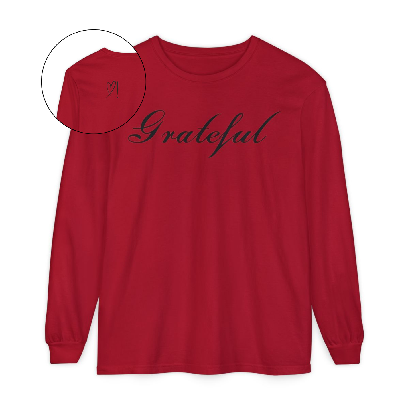 On the front of this custom long sleeve t-shirt in cursive writing is the word grateful on the upper chest, on the back left shoulder blade is an image of a heart with an exclamation mark next to it.