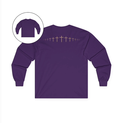 On the back of this purple colored Christian long sleeve shirt is a large wooden Jesus cross in between the shoulder blades, the Jesus cross then keeps getting smaller and smaller till it fades right off the shirt giving it a amazing 3D look on the back.