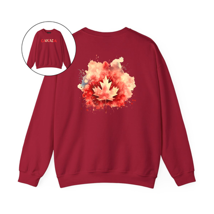 On the front of this Canadian pride pullover sweater is Canada in red and beige letters with a maple leaf in the middle, on the back of the sweater is a large maple leaf that looks like it has been spray painted onto the sweater in red and beige.