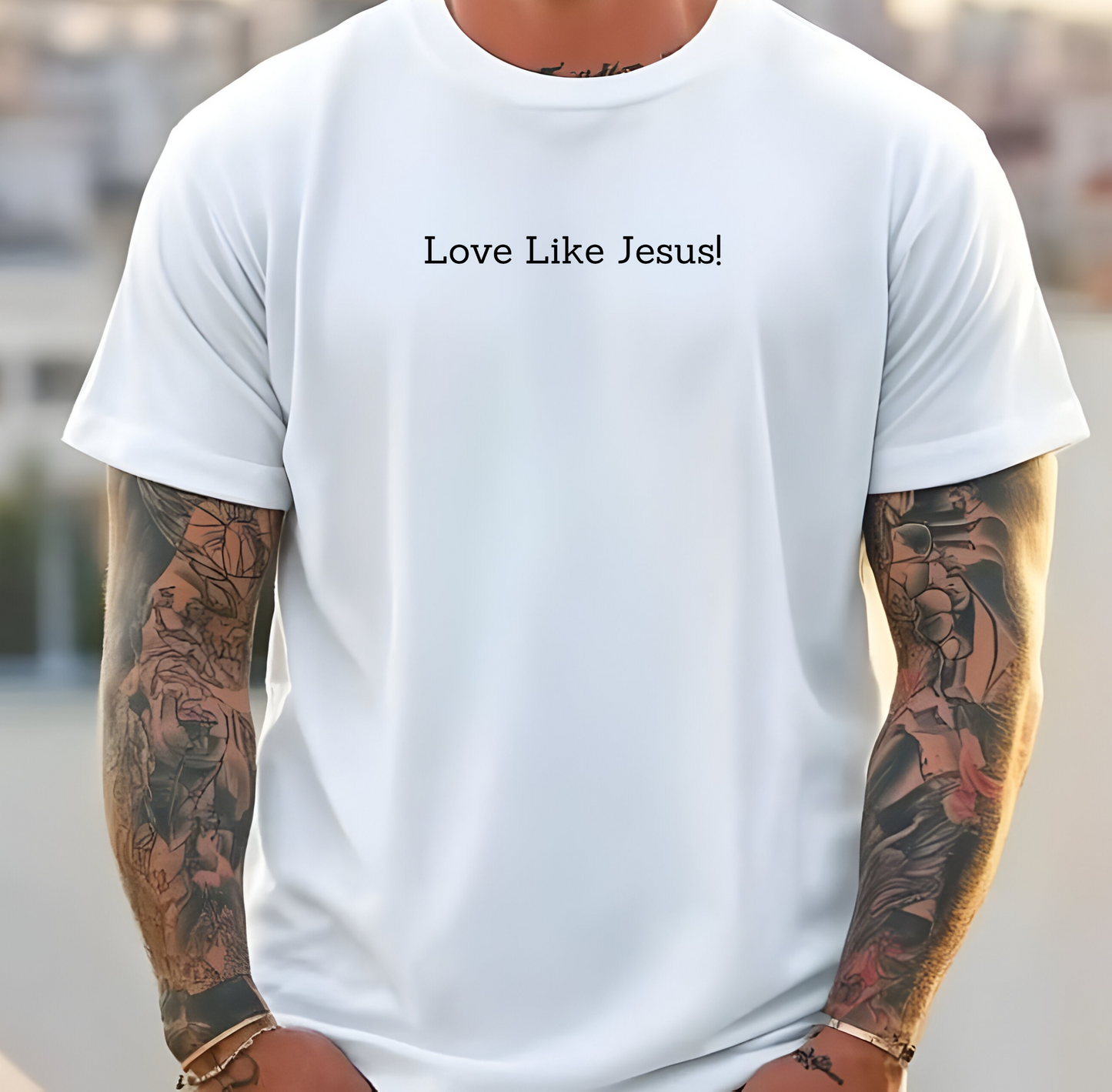 On the front of this custom Christian short sleeve shirt are the words Love Like Jesus in a modern font on the top of the shirt.