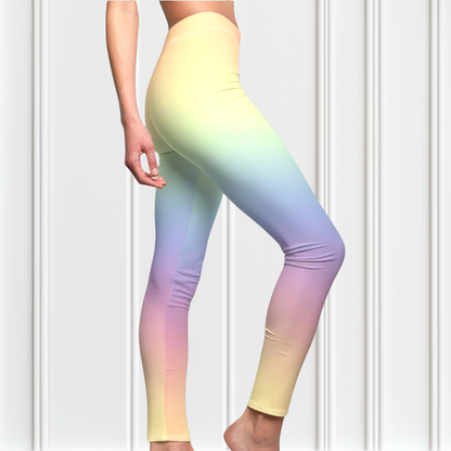 A pair of custom women's high waisted leggings with a soft gradient rainbow pattern all over the pants from top to bottom.