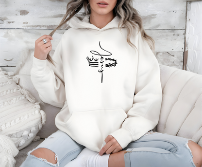 This custom unisex Christian hoodie features the name of Jesus in a cursive font down the center of the front of the sweater, there is an image of a crown on the right and a crown of thorns on the left of the name of Jesus.