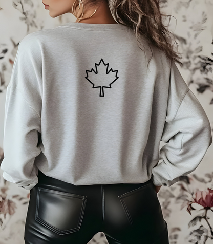 On the back of this custom Canadian pullover sweatshirt is a maple leaf that is right in between the shoulder blades, the front of the sweater is blank.