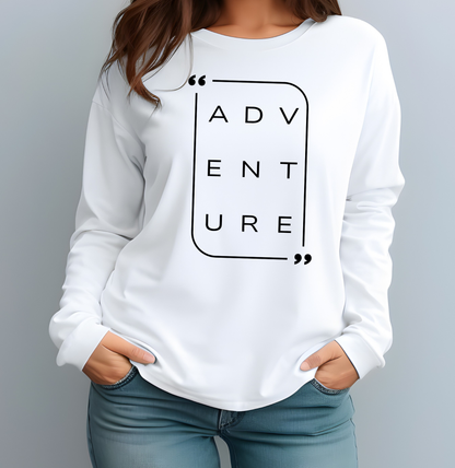 On the front of this super soft unisex long sleeve shirt is the word adventure with there being three letters on each line, it is in a modern font. There is a border around the word.