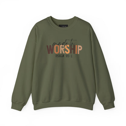 On the front of this Christian pullover sweatshirt it says Made To Worship Psalm 95:1, the word worship is done in large block letters with every letter being a different shade of brown.