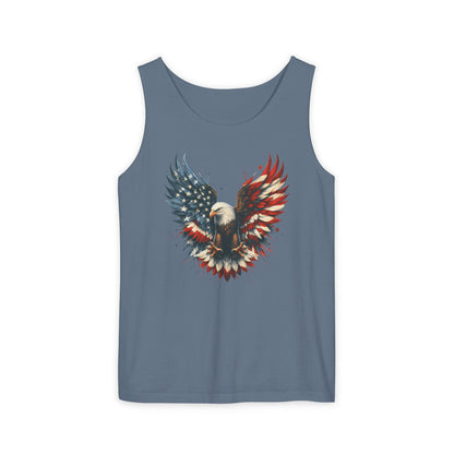 On the front of this unisex tank top is an image of an American Bald Eagle with it's wings out, the feathers of the bald eagle are the colors of the American flag being red, white and blue, there are also stars on one side of the eagle’s wings.