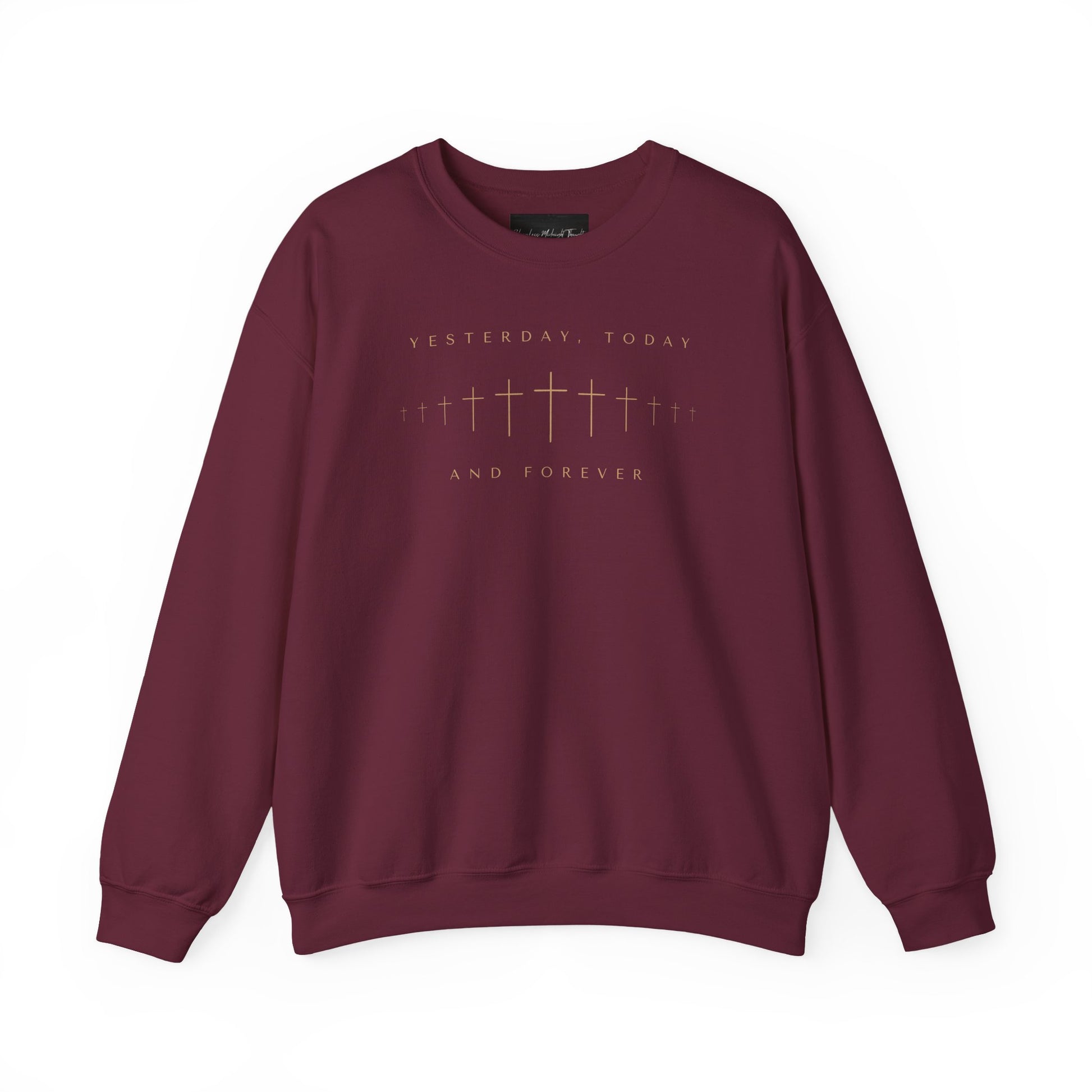 On the front of this Christian pullover sweatshirt is a row of Jesus crosses that look like they are fading into the distance, the words Yesterday, Today and Forever are on the top and the bottom of the crosses.