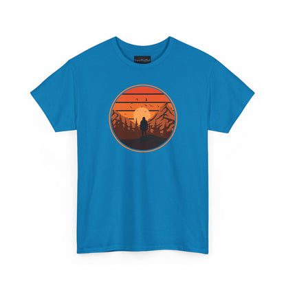 On the front of this custom tee is a large circle on the center of the chest that has an image of bigfoot right in the middle, there is a sun setting with mountain ranges and pine trees in the background.