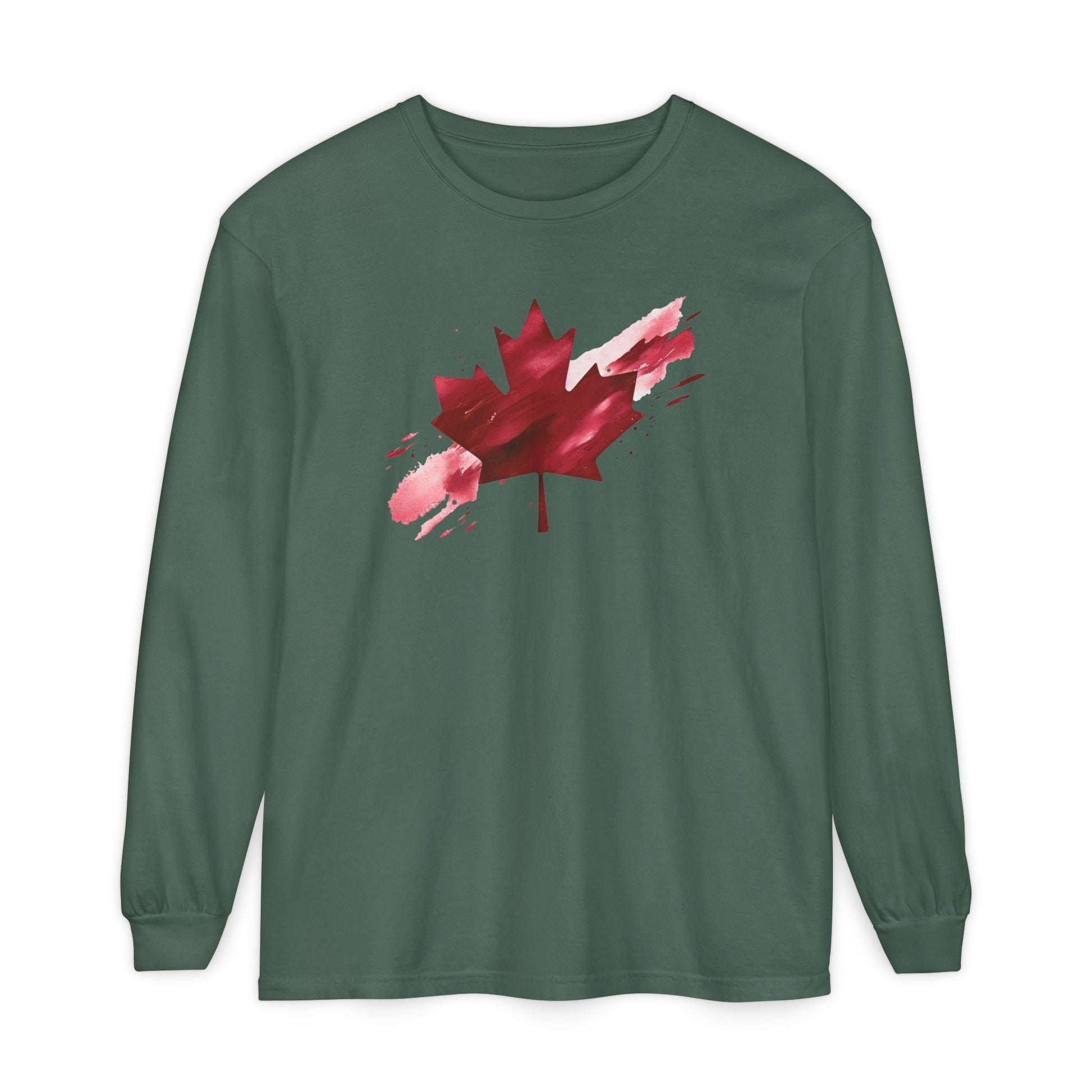 On the front of this unisex long sleeve shirt is an image of a Canadian maple leaf that is bright red, it looks like it has been spray painted onto the front of the shirt.