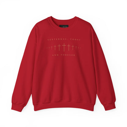 On the front of this Christian pullover sweatshirt is a row of Jesus crosses that look like they are fading into the distance, the words Yesterday, Today and Forever are on the top and the bottom of the crosses.