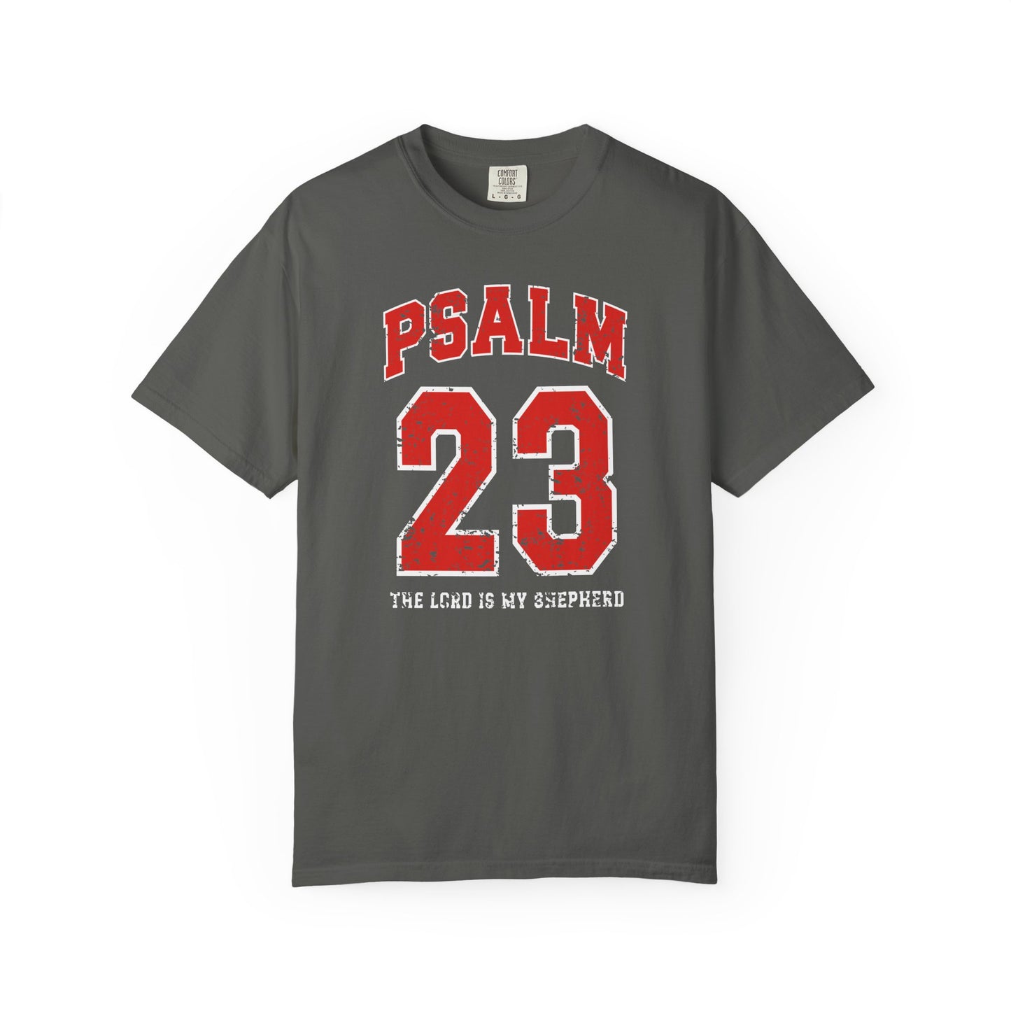 On the front side of this custom vintage t-shirt are the words Psalm 23 The Lord Is My Shepherd, it is with red and white block lettering.