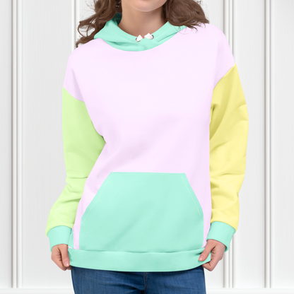 A custom hand sewn unisex hoodie that has a pastel color block design, the front and the back of the sweater are a light purple with the bottom waistband, the front pocket, hood and each cuff is a light mint green, the left sleeve is yellow and the right sleeve is a light grass green.