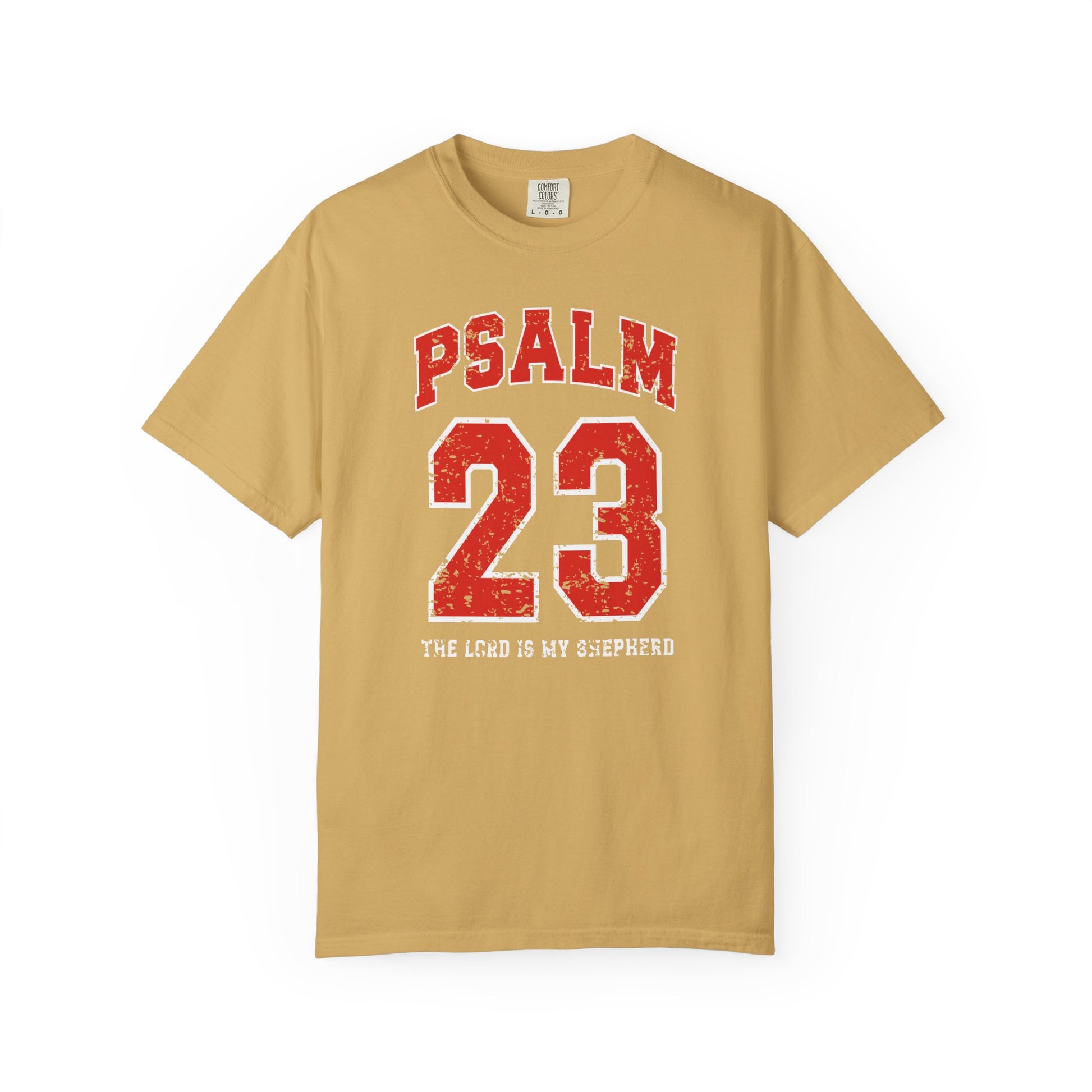 On the front side of this custom vintage t-shirt are the words Psalm 23 The Lord Is My Shepherd, it is with red and white block lettering.
