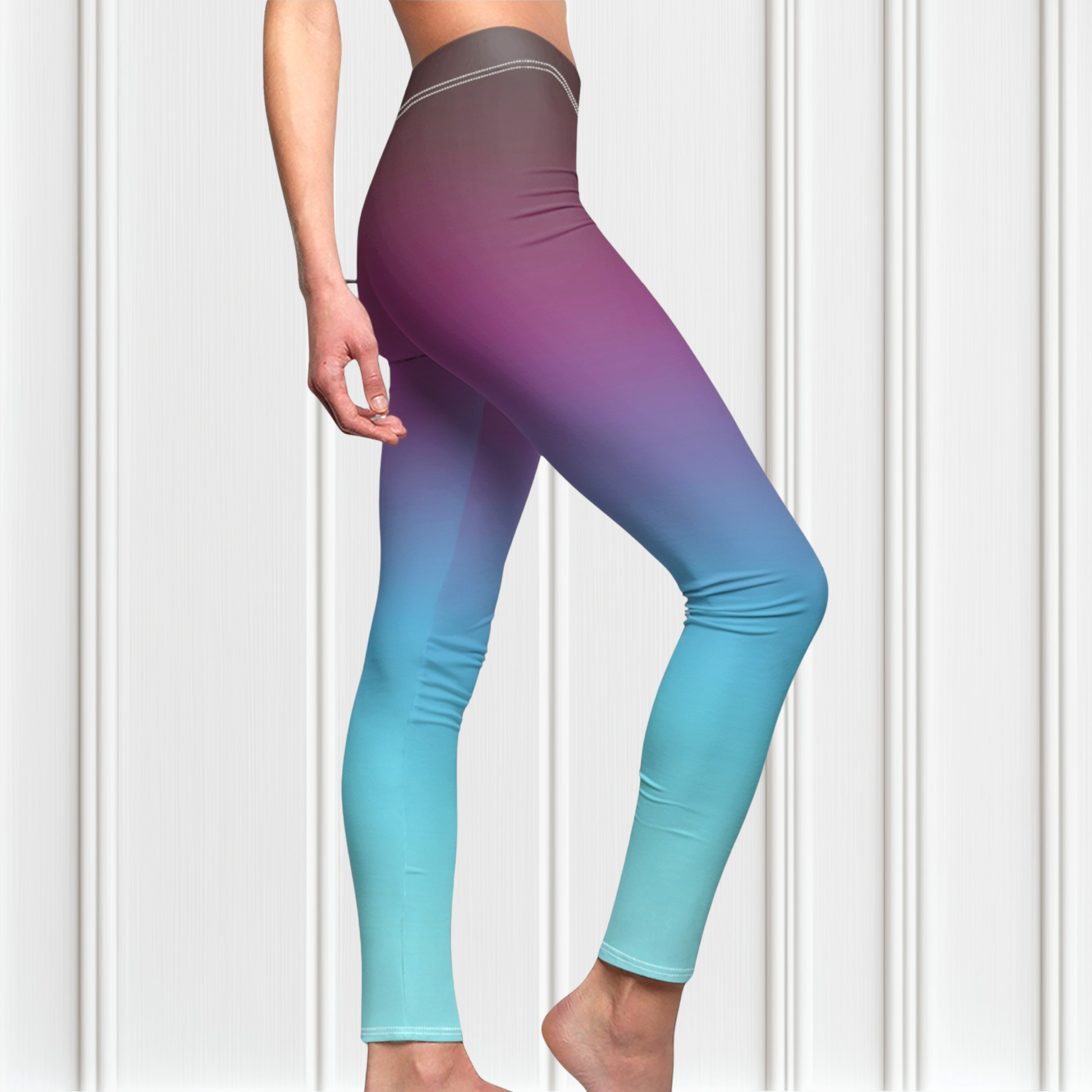 These custom handmade high waisted women's leggings have a ombre pattern with the top of the leggings being a deep purple in color then it fading to a bright turquoise blue at the bottom.