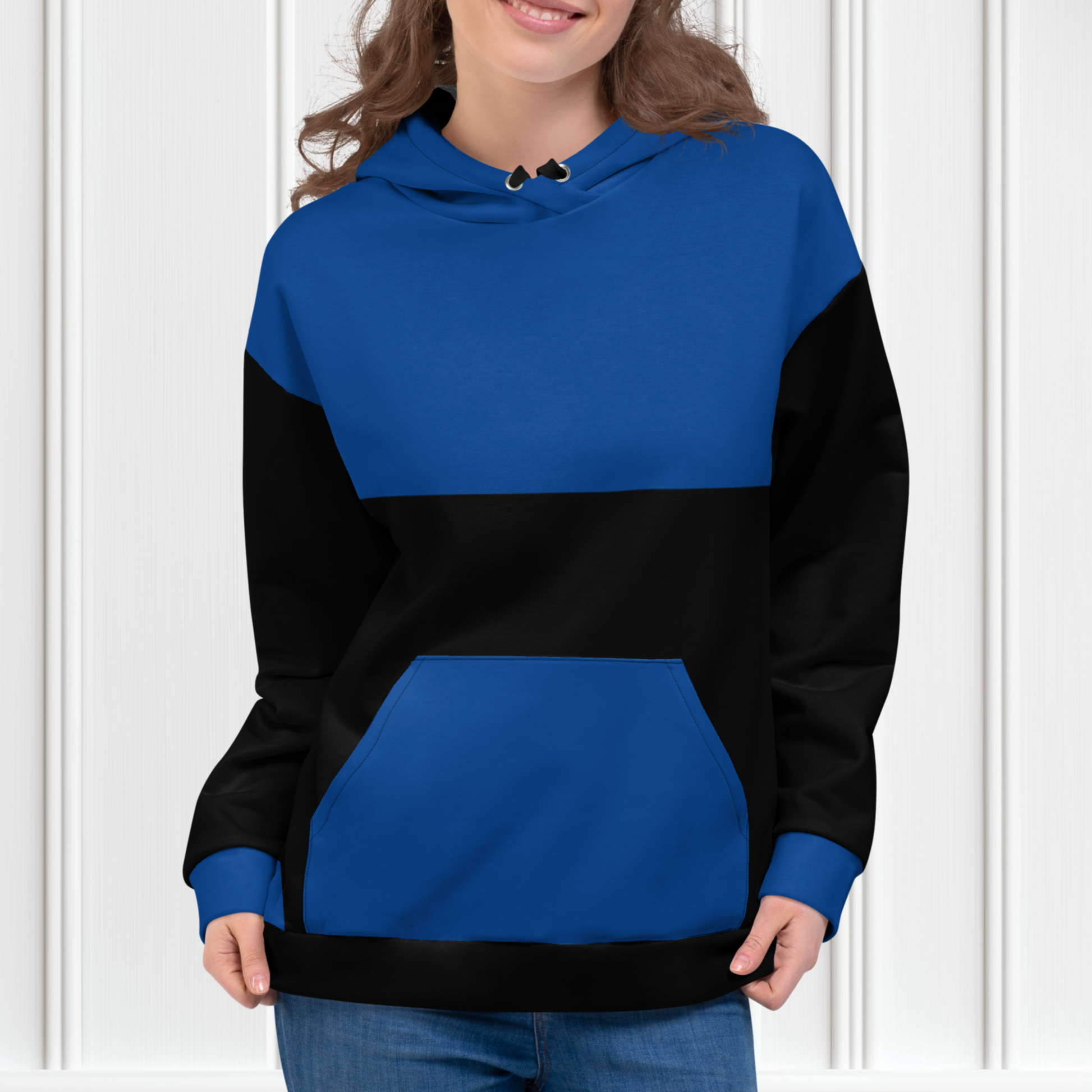 A custom unisex hand sewn hoodie with the top half along with the front pocket being a bright blue color, the rest of the hoodie is black in color,