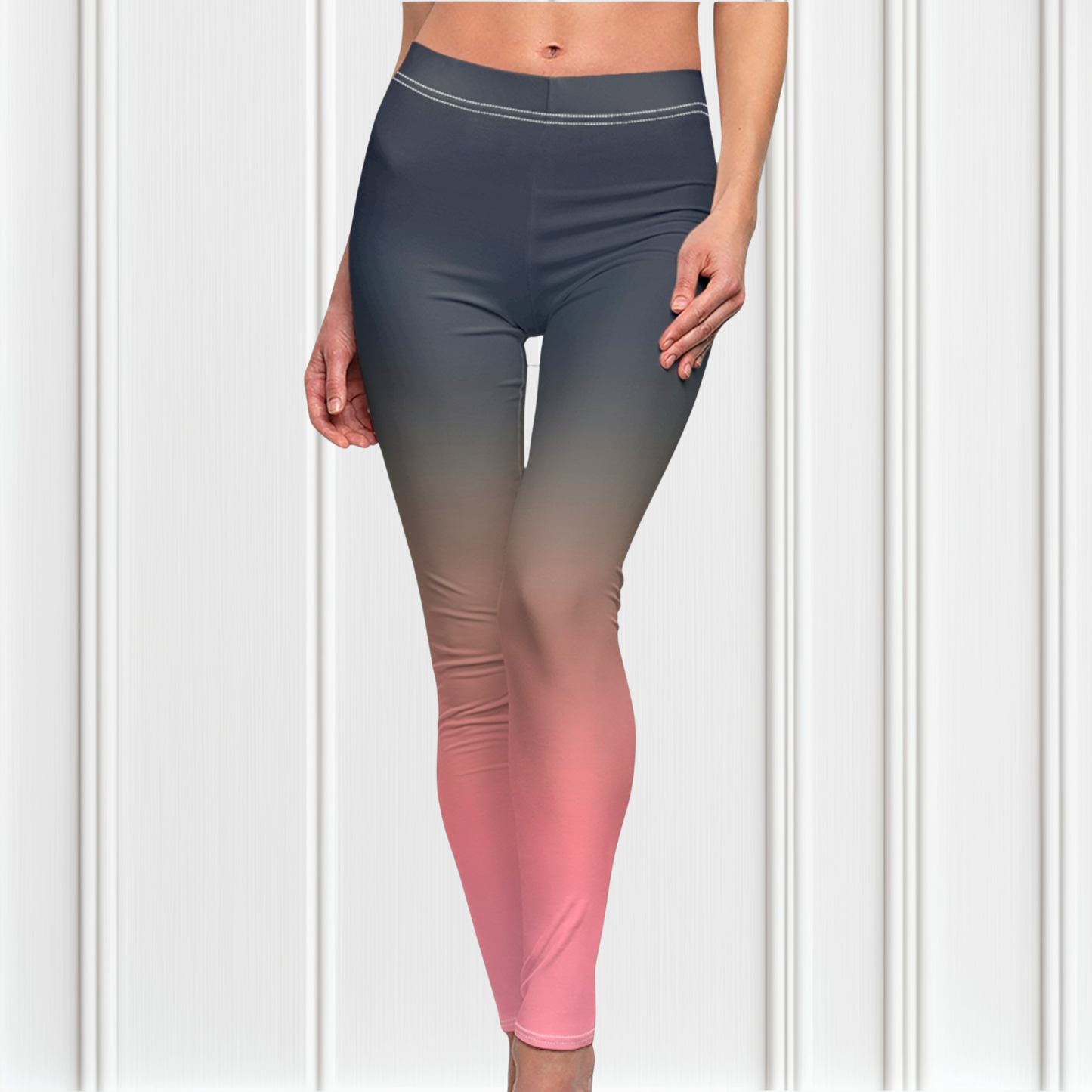 A pair of custom handmade high waisted women's leggings that have a ombre pattern that starts as navy blue at the top waistline of the leggings then fades to a light bubble gum pink at the ankles of the pants.