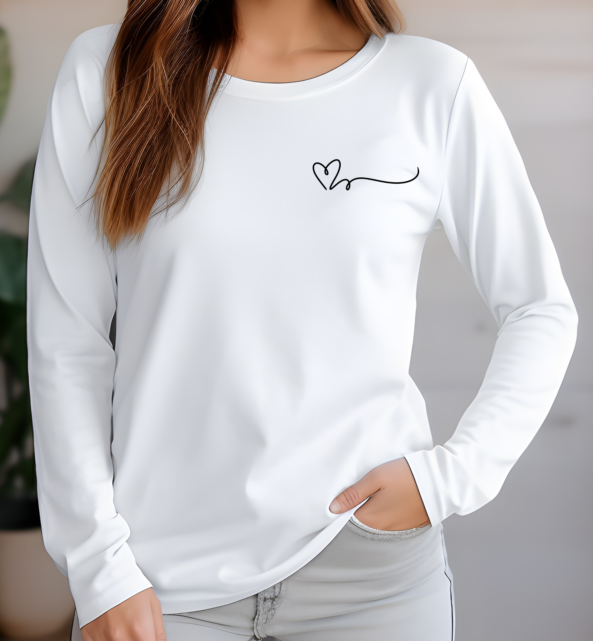 On the top right chest of this custom long sleeve t-shirt is a heart with a trail behind it signifying a heartbeat that you would see on a heart monitor. Perfect for health care workers and teachers.