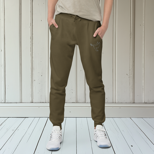 A pair of super soft ankle length unisex Christian sweatpants, there are two pockets on the front and one pocket on the back right, on the front left pocket  there is an embroidered dove with a fig leaf in silver thread.