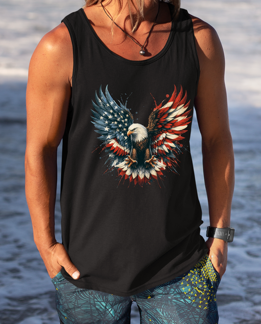 On the front of this unisex tank top is an image of an American Bald Eagle with it's wings out, the feathers of the bald eagle are the colors of the American flag being red, white and blue, there are also stars on one side of the eagle’s wings.