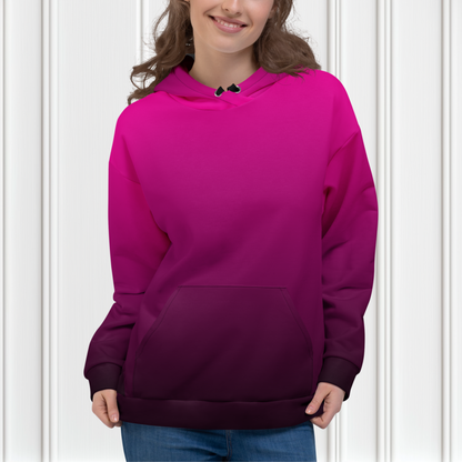 A handmade custom women's pullover hooded sweatshirt that has an ombre design with the top of the hoodie being a bright hot pink then it gradually fading to a very deep purple at the bottom of the hoodie.