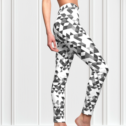A  pair of women's handmade custom high waisted leggings, the leggings have a black, grey and white geometric pattern all across the entire pair of workout leggings.