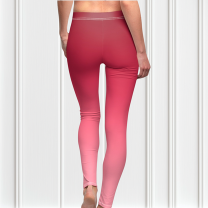 These custom handmade women's high waisted leggings have a pink ombre design with the top of the pants being a dark pink then it fading to a light baby pink at the ankles of the pants.
