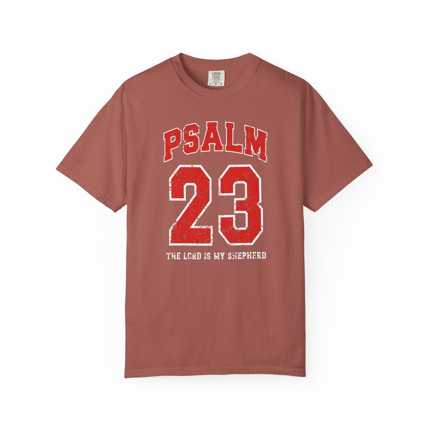 On the front side of this custom vintage t-shirt are the words Psalm 23 The Lord Is My Shepherd, it is with red and white block lettering.