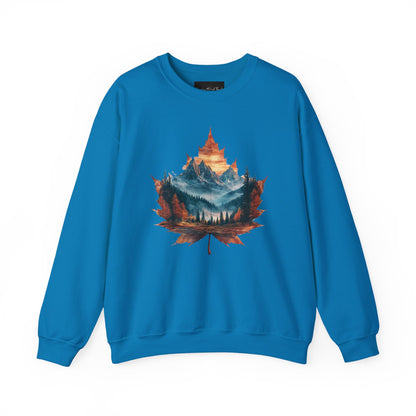 On the front of this Canadian pride sweatshirt is a large maple leaf with the inside of the leaf having a picture of the Rocky Mountains in the fall time.