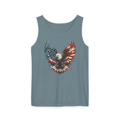 On the front of this unisex tank top is an image of an American Bald Eagle with it's wings out, the feathers of the bald eagle are the colors of the American flag being red, white and blue, there are also stars on one side of the eagle’s wings.