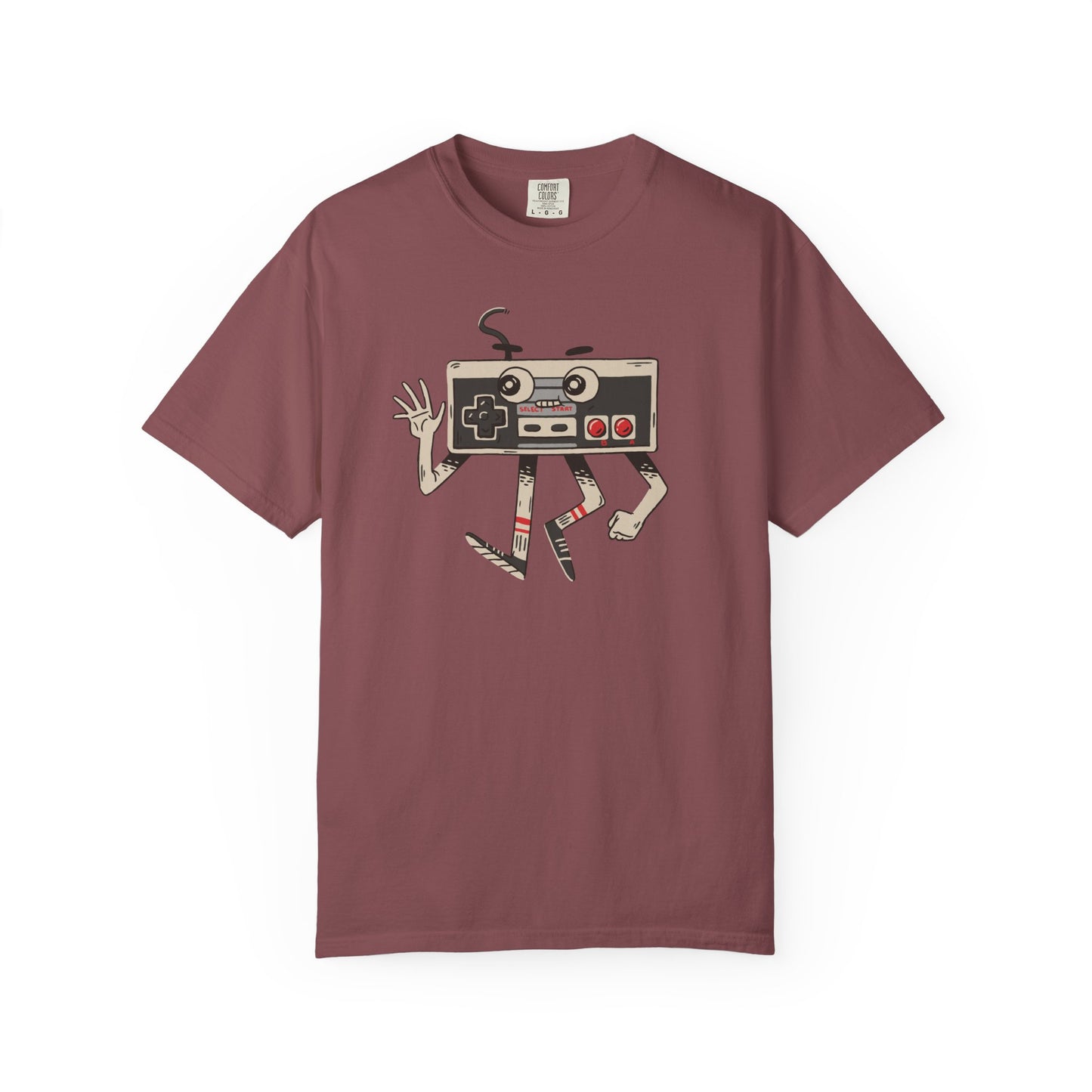 On the front of this custom vintage gaming short sleeve shirt is an image of a old school Nintendo controller, the controller has arms and legs and a face that makes it look like a cartoon character.