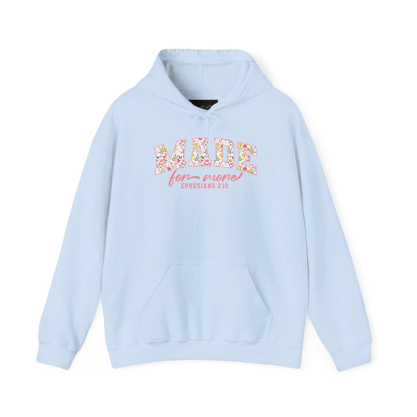 On the front of this custom Christian hoodie is the bible verse the says Made for more Ephesians 2:10, with the word "Made" being large block letters with a pink floral pattern inside the letters, all the other words are in a light pink color.