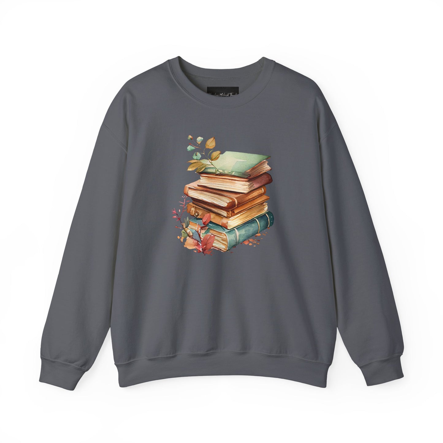 On the front of this custom book lovers sweatshirt is a stack of vintage books with a bunch of wildflowers all around the books.