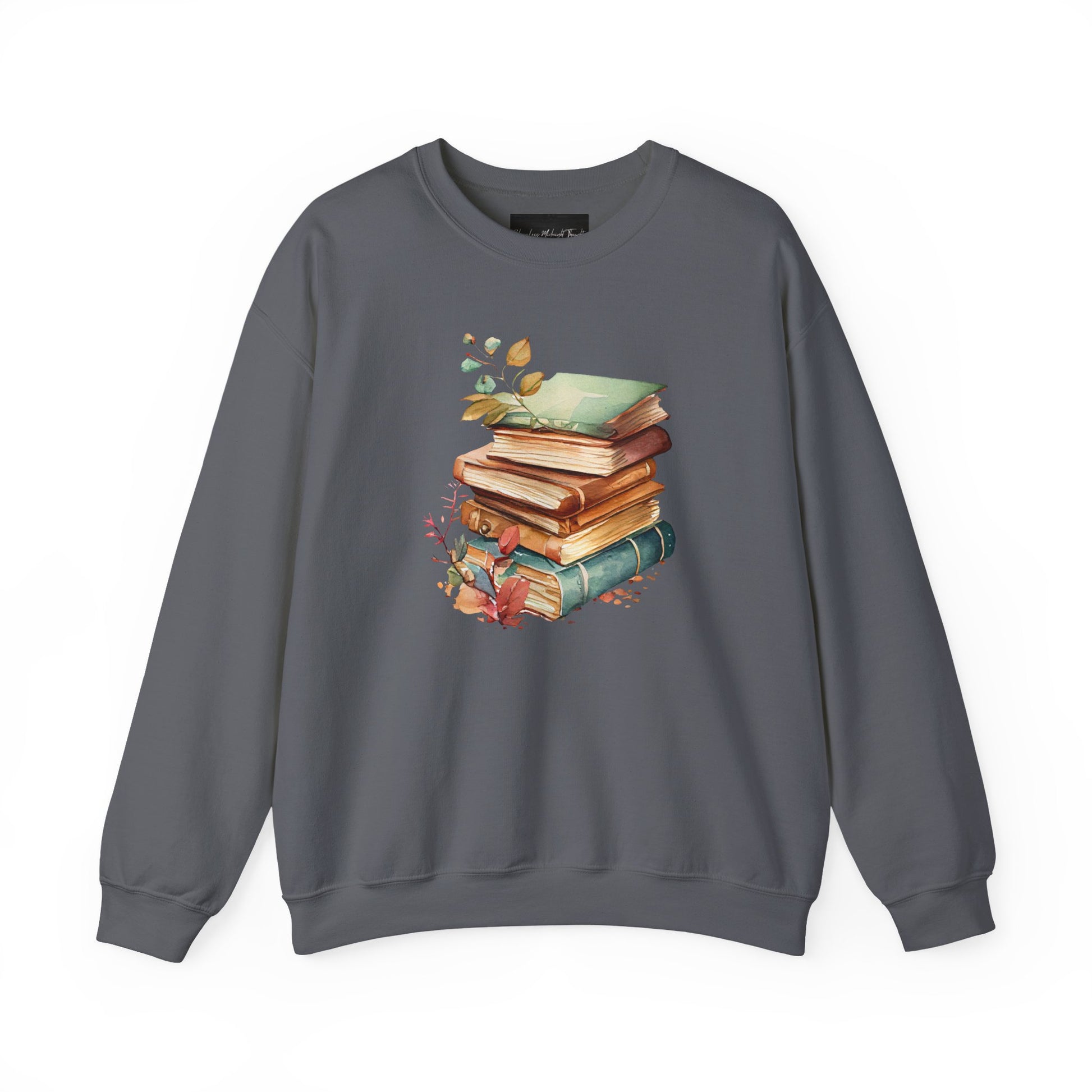 On the front of this custom book lovers sweatshirt is a stack of vintage books with a bunch of wildflowers all around the books.