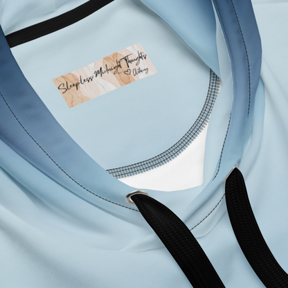 A custom handmade unisex pullover hooded sweatshirt with an ombre design with the top of the hoodie being a very light blue color then it slowly shifting to a navy blue at the bottom of the hoodie.