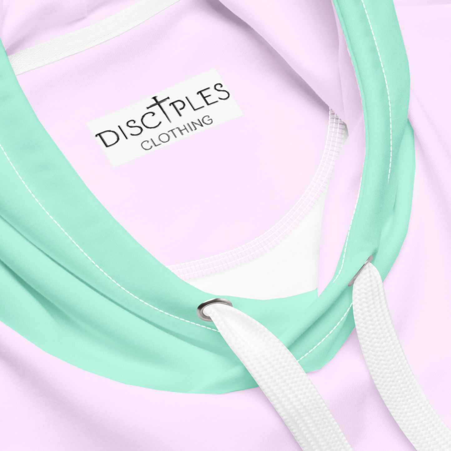 A custom hand sewn unisex hoodie that has a pastel color block design, the front and the back of the sweater are a light purple with the bottom waistband, the front pocket, hood and each cuff is a light mint green, the left sleeve is yellow and the right sleeve is a light grass green.