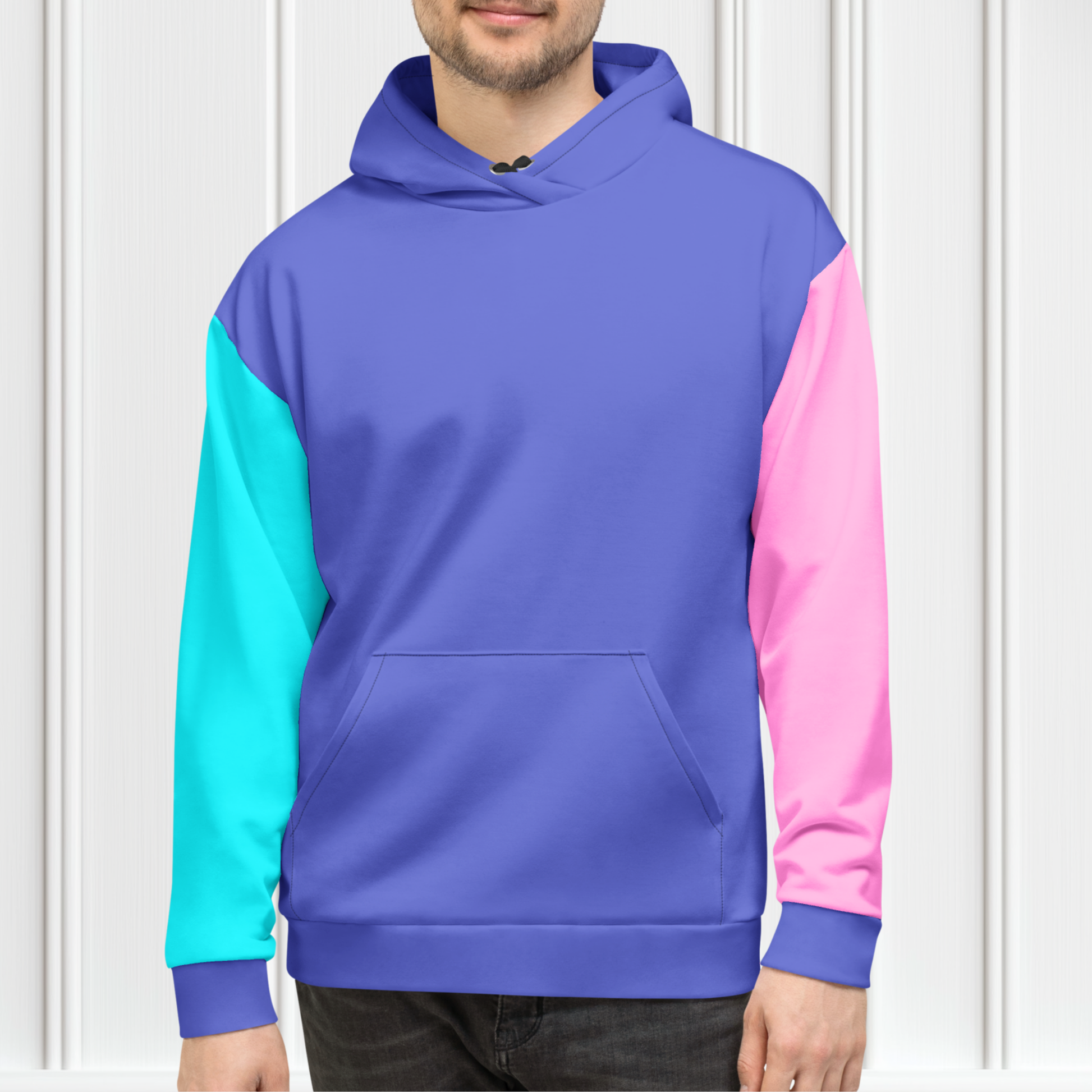 A custom hand sewn unisex hoodie that is purple on the front and the back along with the hood, the right sleeve is a bright turquoise blue with the left sleeve of the sweater being a bubblegum pink.