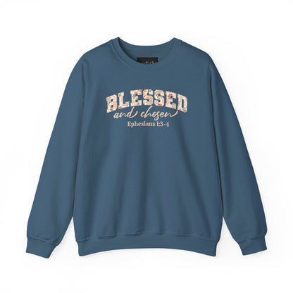 On the front of this custom Christian sweatshirt is the bible verse Blessed and Chosen Ephesians 1:3-4 with the word Blessed being in large bubble letters with a floral pattern on the inside of the letters.