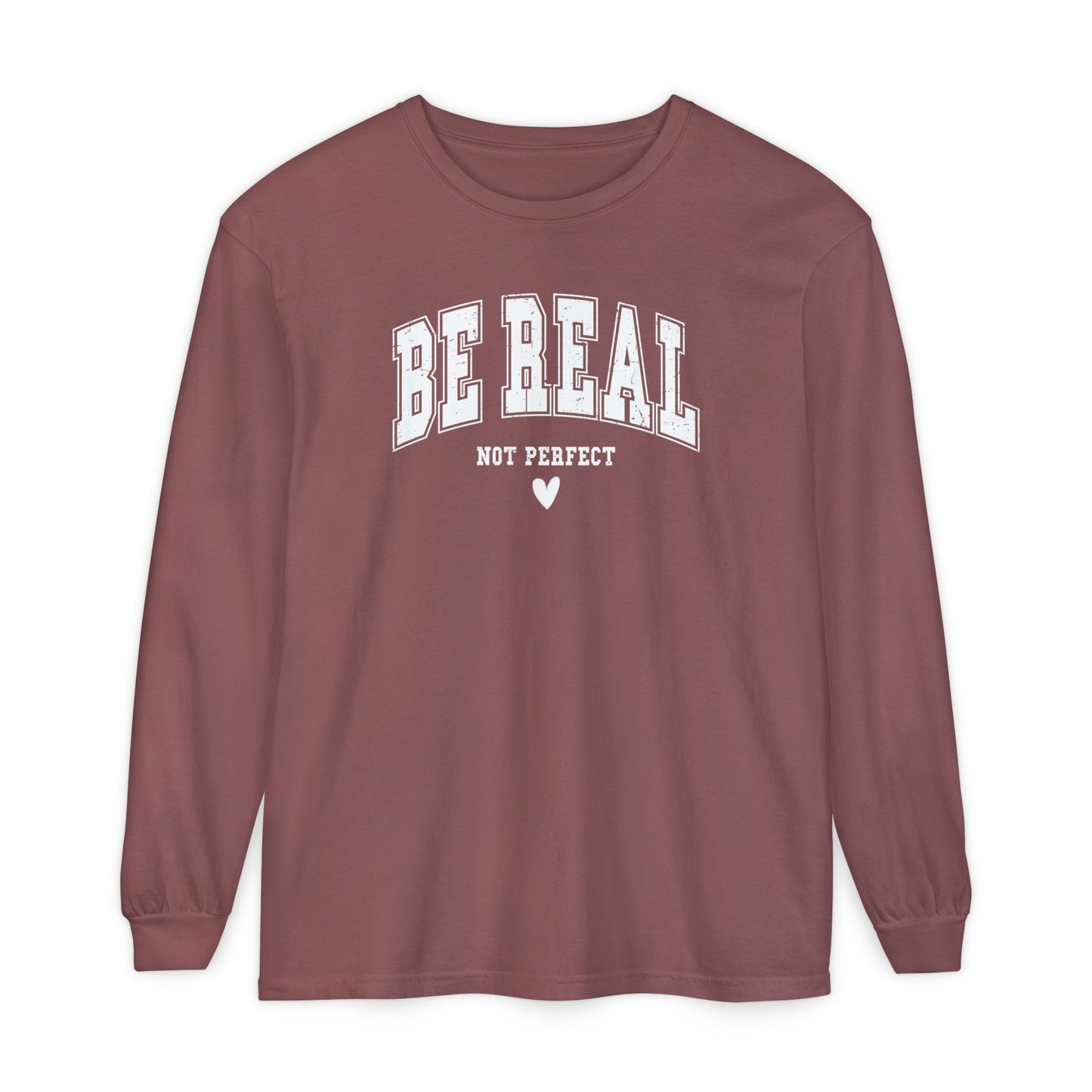 On the front of this custom unisex long sleeve shirt are the words Be Real in large bubble font with the words not perfect underneath the bubble letters, on the bottom there is a heart.