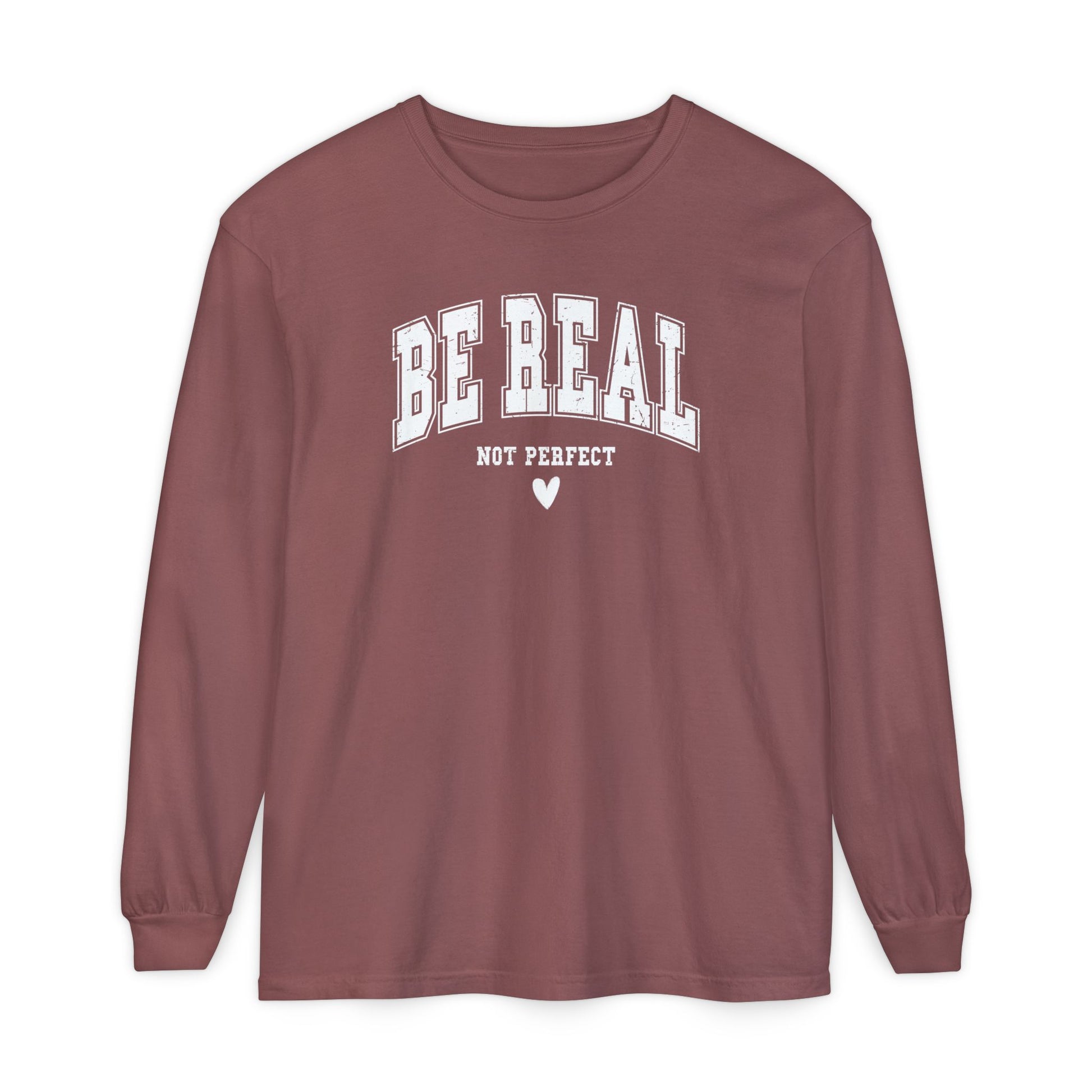 On the front of this custom unisex long sleeve shirt are the words Be Real in large bubble font with the words not perfect underneath the bubble letters, on the bottom there is a heart.