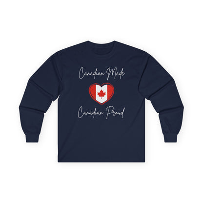 On the front of this custom Canadian patriotic long sleeve t-shirt are the words Canadian Made Canadian Proud in a beautiful cursive font, there is a Canadian flag in the middle that is in the shape of a heart.
