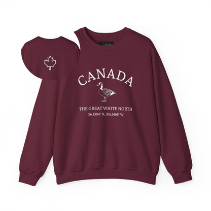 On the front of this unisex super soft Canadian sweatshirt is the word Canada in large text on the top with an image of a Canadian Goose underneath. Under the Goose are the words The Great White North with Canada's geological location under that.