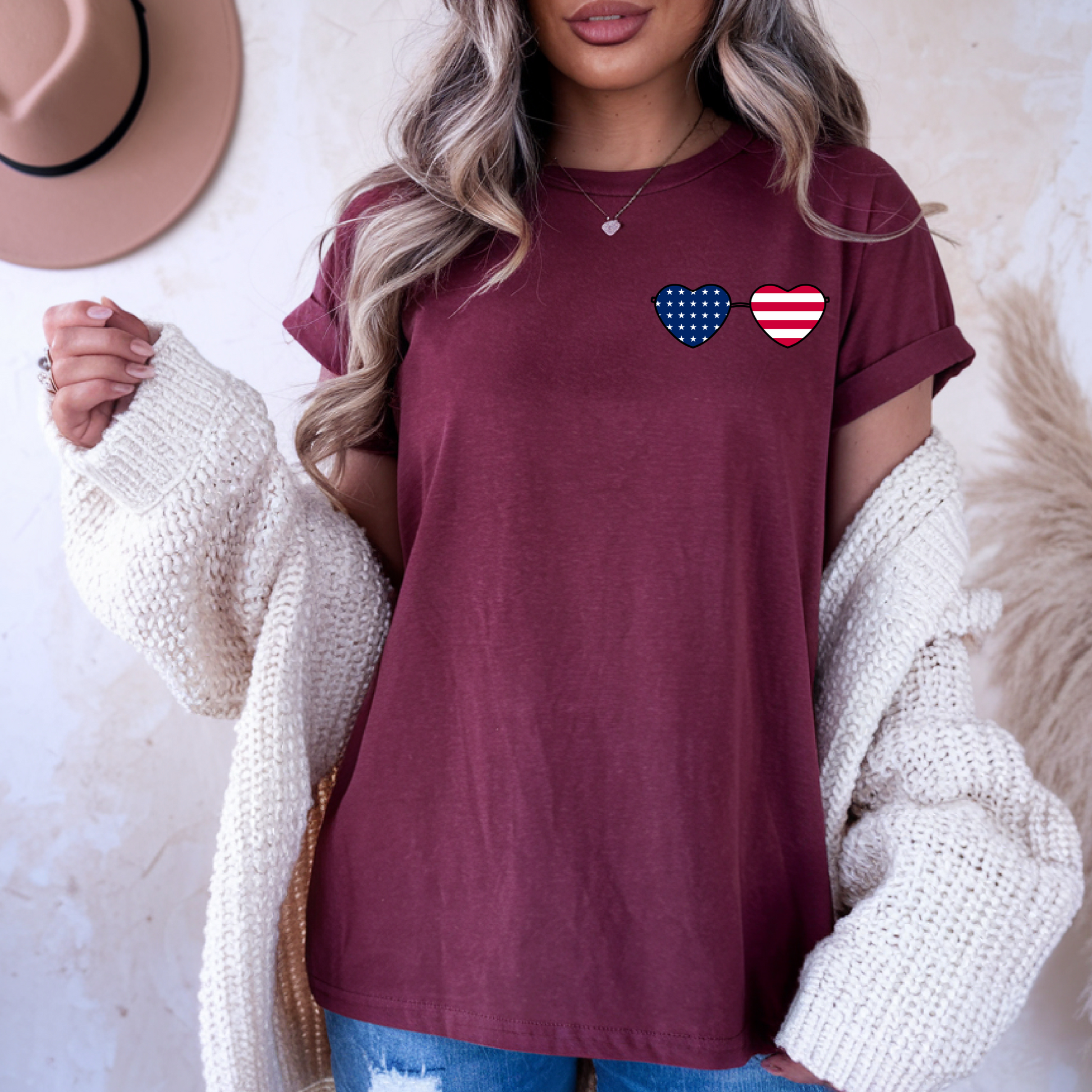 This super soft unisex t-shirt has a image of a pair of heart shaped sunglasses over the front left chest of the shirt, the American flag is inside the sunglasses. Perfect for 4th of July celebrations.