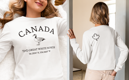 This custom Canadian made unisex long sleeve t-shirt features a Canadian goose on the front in the center of the shirt with the words 'Canada'  above it and 'The Great White North' under the goose, on the back left shoulder blade of the long sleeve shirt is a maple leaf.