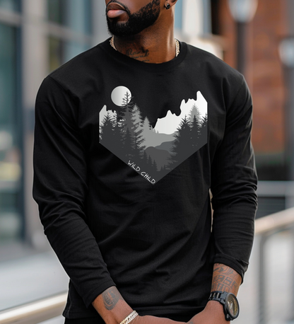 The image on the front of this custom long sleeve shirt is all in black and grey with there being mountains and trees on both sides in the shape on a v making it looking as if you are looking down a valley, the words wild child are in white on the bottom left of the image.