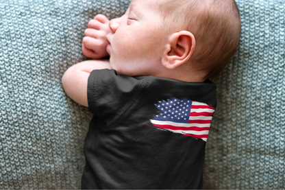 On the front of this custom baby onesie are the words Made In America in a rectangular box that makes it look like a stamp, on the back of this bodysuit is the American flag.