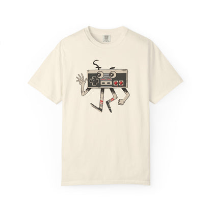 On the front of this custom vintage gaming short sleeve shirt is an image of a old school Nintendo controller, the controller has arms and legs and a face that makes it look like a cartoon character.