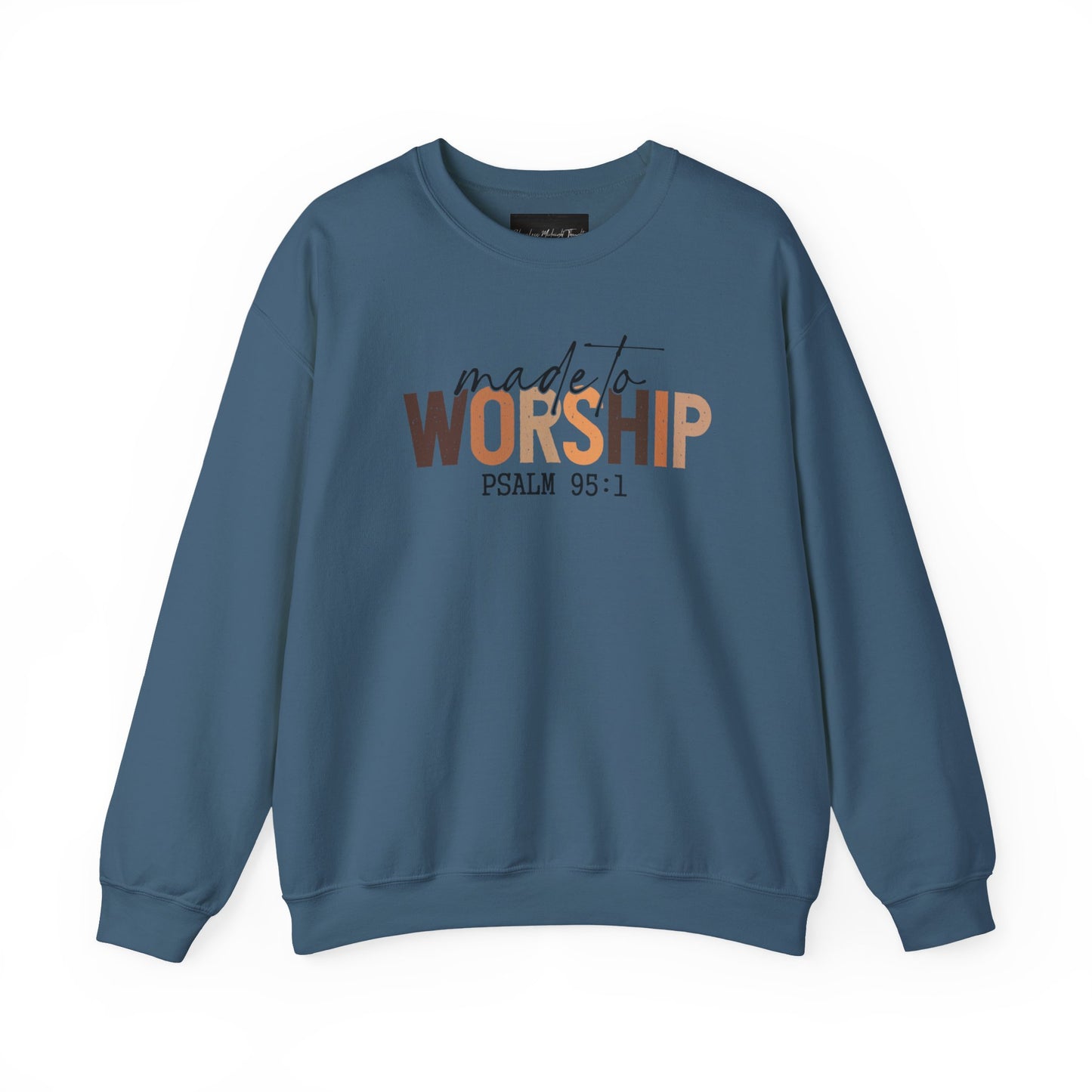 On the front of this Christian pullover sweatshirt it says Made To Worship Psalm 95:1, the word worship is done in large block letters with every letter being a different shade of brown.