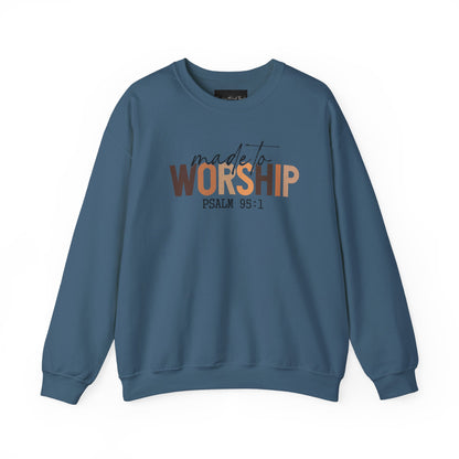 On the front of this Christian pullover sweatshirt it says Made To Worship Psalm 95:1, the word worship is done in large block letters with every letter being a different shade of brown.